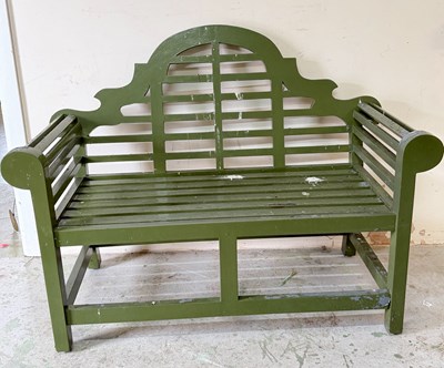 Lot 194 - A green painted wooden garden bench, Lutyen...