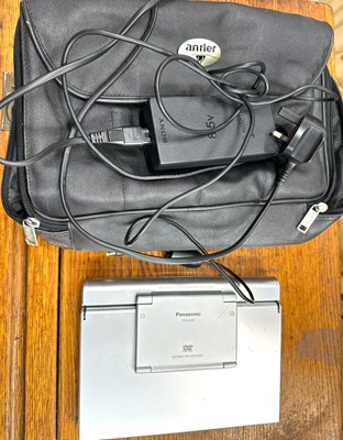 Lot 725 - A portable Panasonic DVD player with cables...