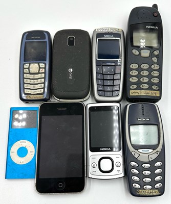 Lot 849 - A selection of vintage mobile phones and Apple...