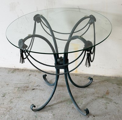 Lot 20 - A Spanish style patinated iron table with...