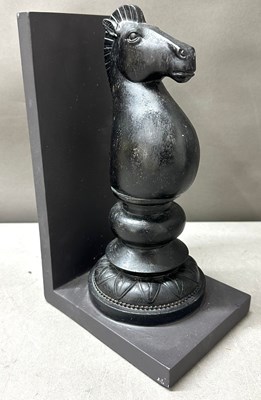 Lot 793 - A black knight chess piece bookend 27cm