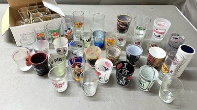 Lot 842 - A large quantity of shot glasses with various...
