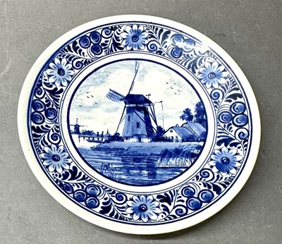 Lot 802 - A decorative porcelain Delft wall plate