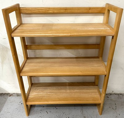Lot 60 - A folding book shelf with three tier design...