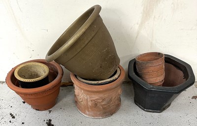 Lot 217 - A selection of terracotta and plastic  plant pots