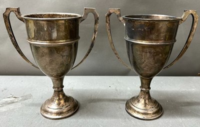Lot 485 - A pair of sterling silver trophy cups...