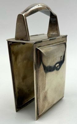 Lot 450 - A sterling silver napkin holder hallmarked...