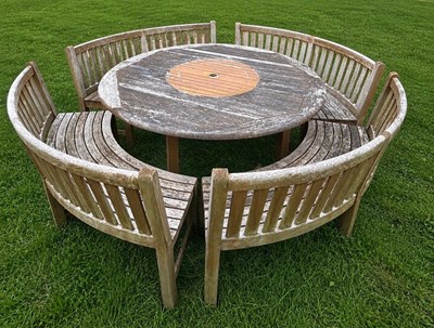 Lot 247 - A weathered Westminster garden furniture set...