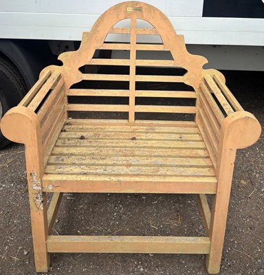 Lot 225 - A Lutyens-style garden chair featuring a...