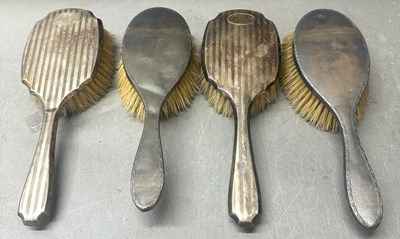 Lot 471 - Four vintage vanity brushes with sterling...
