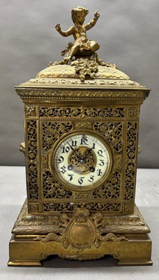 Lot 603 - Victorian pieced Gilt brass table clock,...