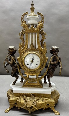 Lot 604 - A 20th-century Louis XVI-style mantle clock...