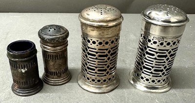 Lot 475 - Two pairs of salt and pepper shakers with...