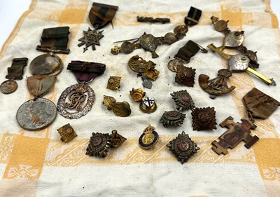 Lot 416 - A selection of military medals, pins, and...