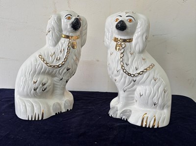 Lot 353 - A pair of Staffordshire ceramic mantle dogs by...