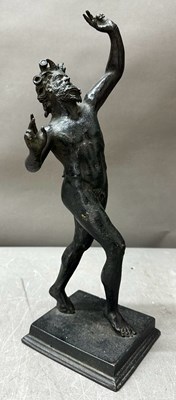 Lot 612 - A bronze replica of the dancing faun of...