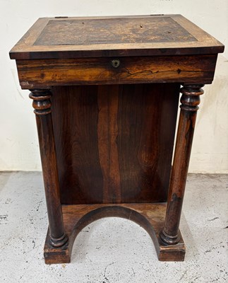 Lot 146 - A Victorian Davenport desk featuring a hinged...