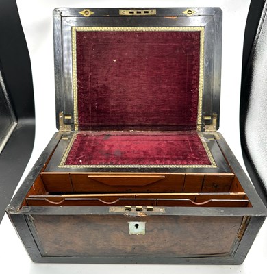 Lot 437B - An antique writing slope with burgundy velvet...