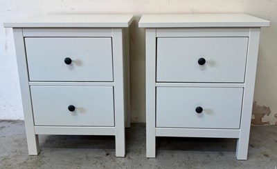 Lot 100 - A pair of Ikea bed side cabinets in white with...