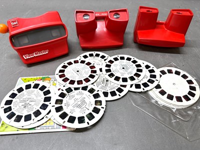 Lot 652 - Three Gaf view master viewers and a selection...