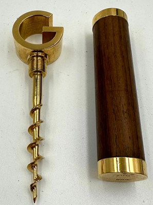 Lot 437D - A Gucci corkscrew with a dark wood handle