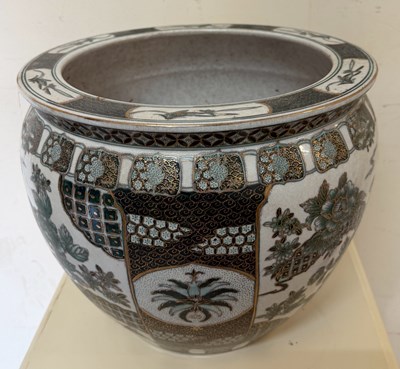 Lot 369 - A green and white glazed Chinese Fish bowl...