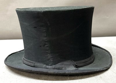 Lot 777 - A collapsible opera hat by Wheelers, London