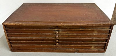 Lot 434 - A vintage table top cabinet with six wooden...
