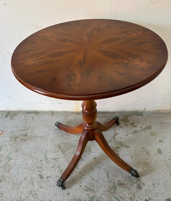 Lot 94 - A Georgian-style side table with a circular...