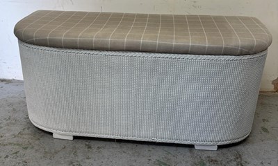 Lot 95 - A wicker storage box/bencch with a cushioned...