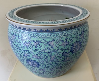 Lot 370 - A light blue with dark blue background glazed...