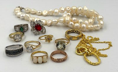 Lot 551 - A selection of costume jewellery to include...