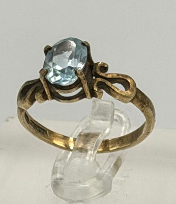Lot 557 - A 9ct aquamarine style ring and pendant with a...