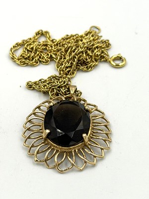 Lot 561 - A 9ct gold pendant, hallmarked to back with...