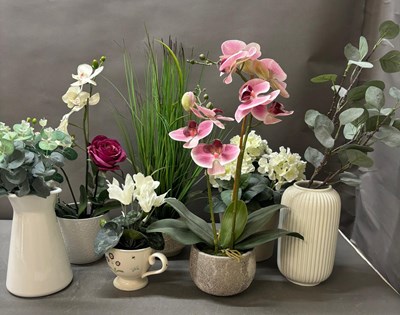 Lot 216 - A collection of a variety artifical plants to...