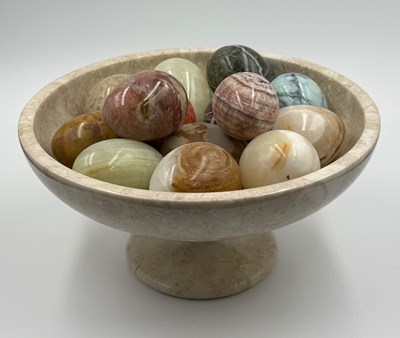 Lot 835 - A marble stand along with marble eggs