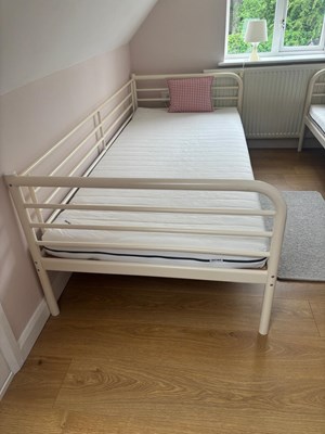 Lot 88 - A single metal Ikea bed with a mattress