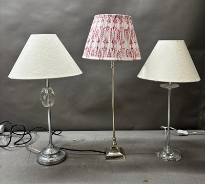 Lot 255 - A selection of chrome table lamps with various...
