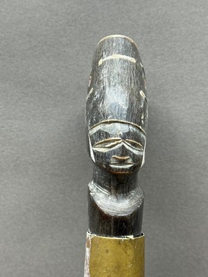Lot 430 - A carved African stacked horn walking stick