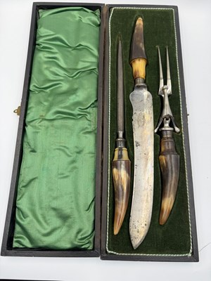 Lot 513 - A cased AF horn handled carving set with...