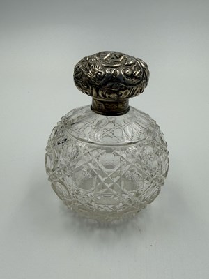 Lot 479 - A silver topped scent bottle by James Deakin &...