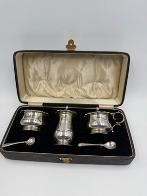 Lot 457 - A cased silver cruet set by John Grinsell &...