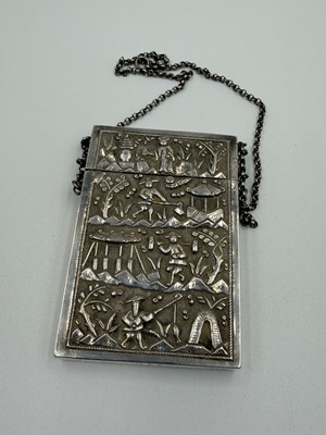 Lot 455 - A Chinese engraved white metal card case,...