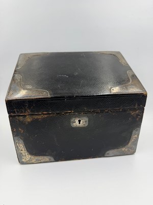 Lot 517 - A Victorian silver mounted, leather...