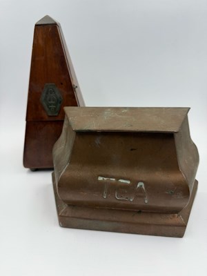 Lot 827 - A copper tea caddy and spoon along with a...