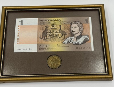 Lot 577 - The framed Australian one-dollar banknote...