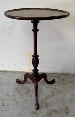 Lot 101 - A mahogany tripod table with a dished top...