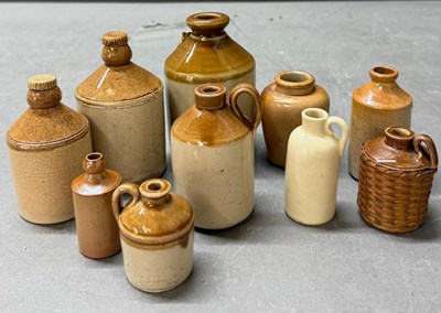 Lot 809 - A selection of miniature salt-glazed flagons