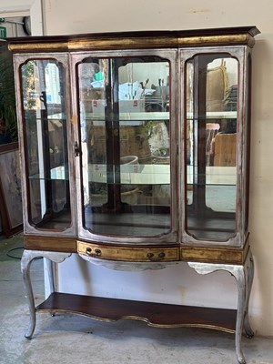 Lot 197 - A vintage French style display cabinet with...