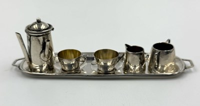 Lot 456 - A miniature silver coffee service by Levi &...